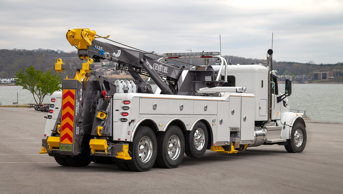 HEAVY DUTY TOW TRUCK Provides  EMERGENCY TOWING SERVICES